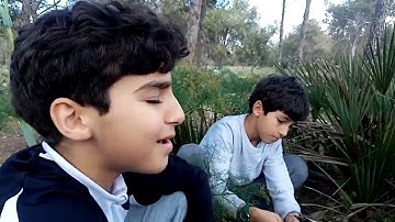 طفل يتلو من سورة الواقعة ويحاكي الشيخ محمد عمران رحمه الله