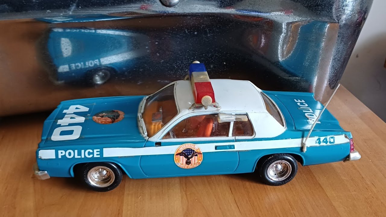 Police car toys from the 1980s battery operated vintage retro