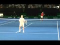 Rod Laver hitting with Roger Federer