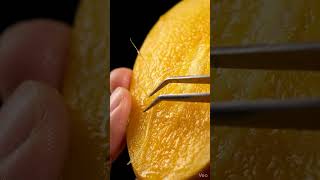 Hands pulling mango fiber #object #asmr #shorts