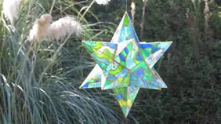 12 pointed pentagon star, Silver edged sun catcher... Beach glass colors...