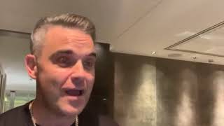 Watch Robbie Williams Dickhead video