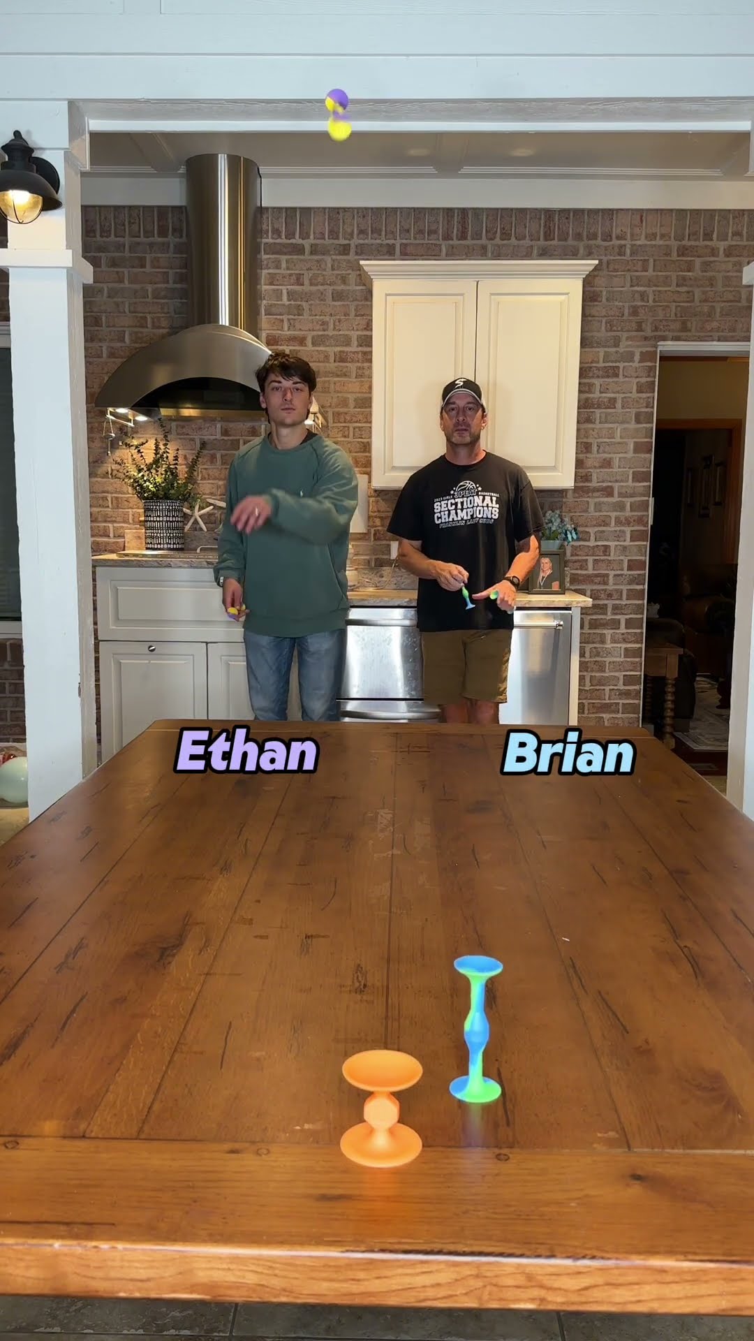 Father vs. son pop dart challenge! #familygames #fathervsson