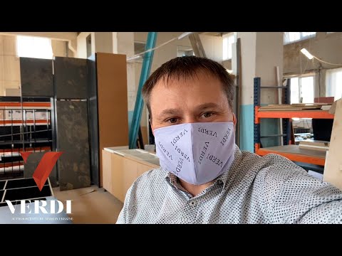 Нестандартная кухня с фасадами из шпона камня