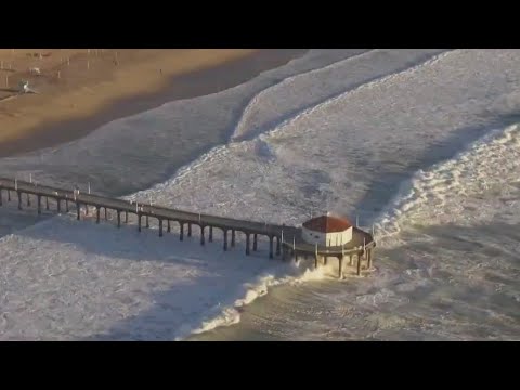 High surf causes flooding in Orange County - YouTube