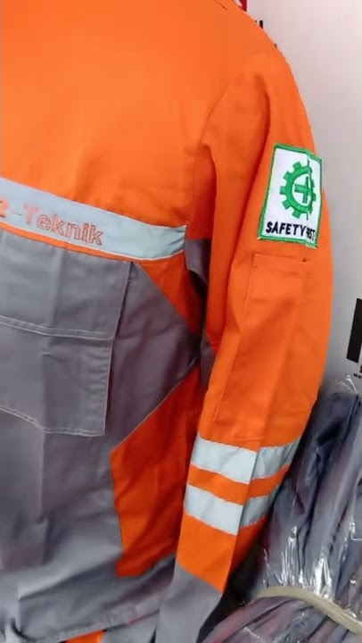 katelpak baju safety pekerja proyek