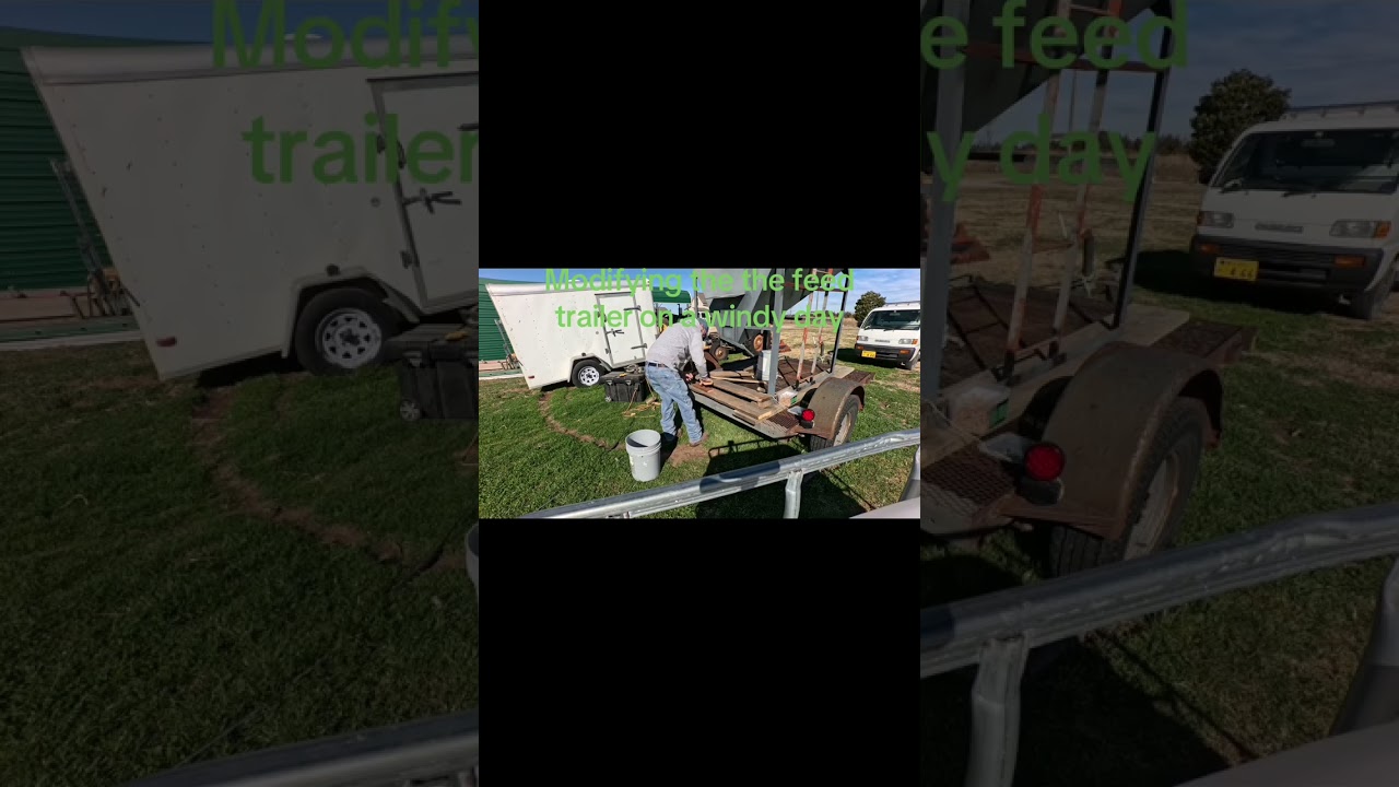 Modifying the feed trailer on a windy day #smallranch #ranchsorting ￼