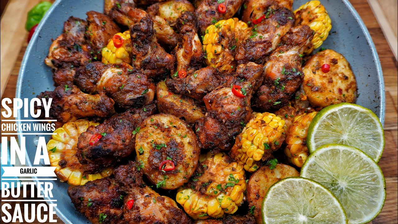SPICY CHICKEN WINGS IN A GARLIC BUTTER SAUCE (SIMILAR TO A SEAFOOD BOIL