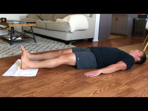 Towel Supine Eccentric Hamstring Curl