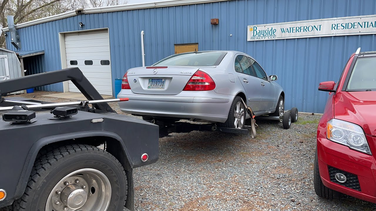 Towing a Mercedes E Class with dollies - YouTube