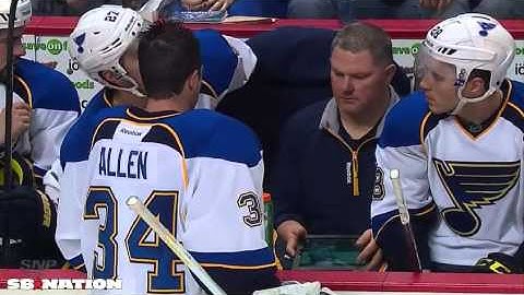 Jake Allen watches shootout video on the bench
