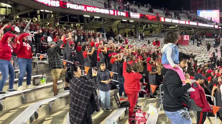 The Spirit of Houston Cougar Marching Band plays their fight song and WOMP WOMP.