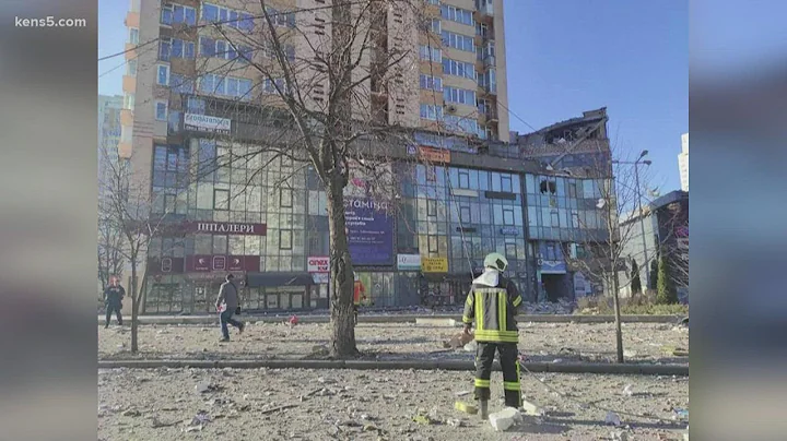 A missile strikes a high-rise apartment building at the Ukrainian capital