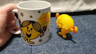 Little Miss Sunshine Drinks From Her Mug