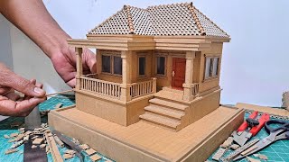 MAKING A HOUSE FROM USED CARDBOARD