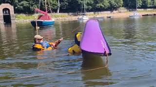 Fully Laden Open Canoe Self Empty and Self Rescue