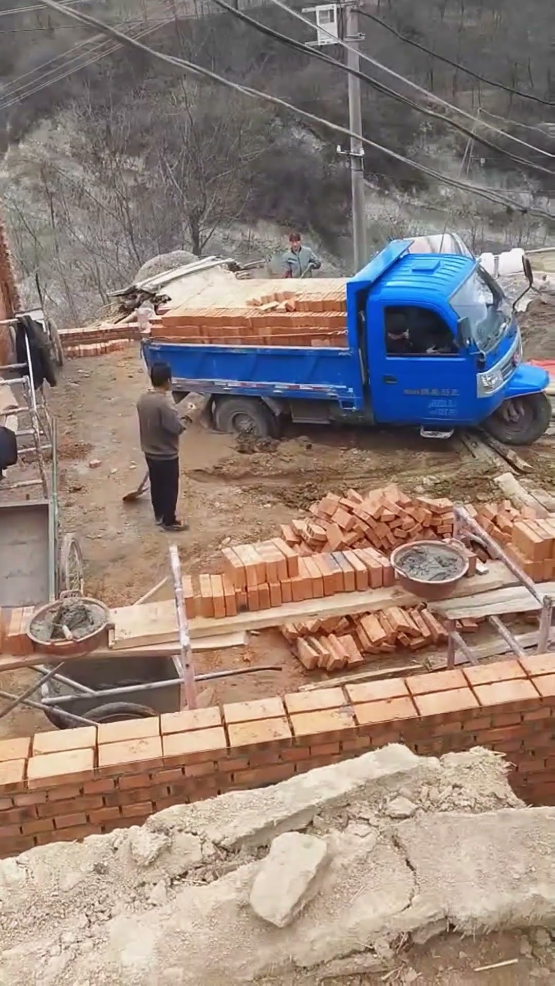 Tractor unloading process of bricks