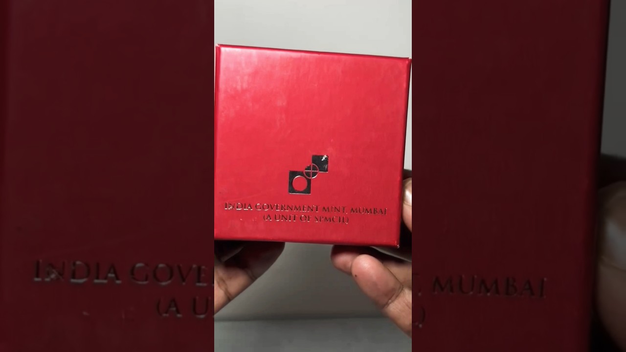 Что находится внутри картонной коробки Монетного двора Мумбаи?