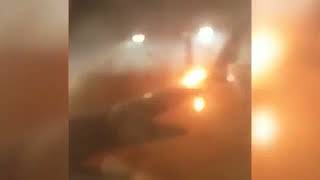 Moment passengers scream in terror as plane bursts into flames after crash with other jet on runway