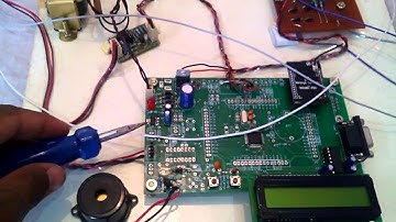 WIRELESS ECG, BODY TEMPERATURE AND HEART BEAT SIGNALS MONITORING AND ALARM SYSTEM