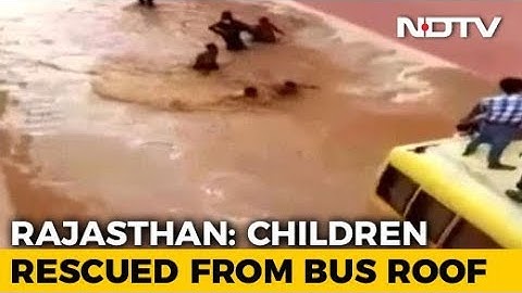 Watch: Rajasthan Students Rescued After Bus Gets Stuck On Flooded Road