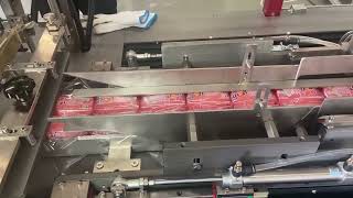 Multi-product overwrapping machine