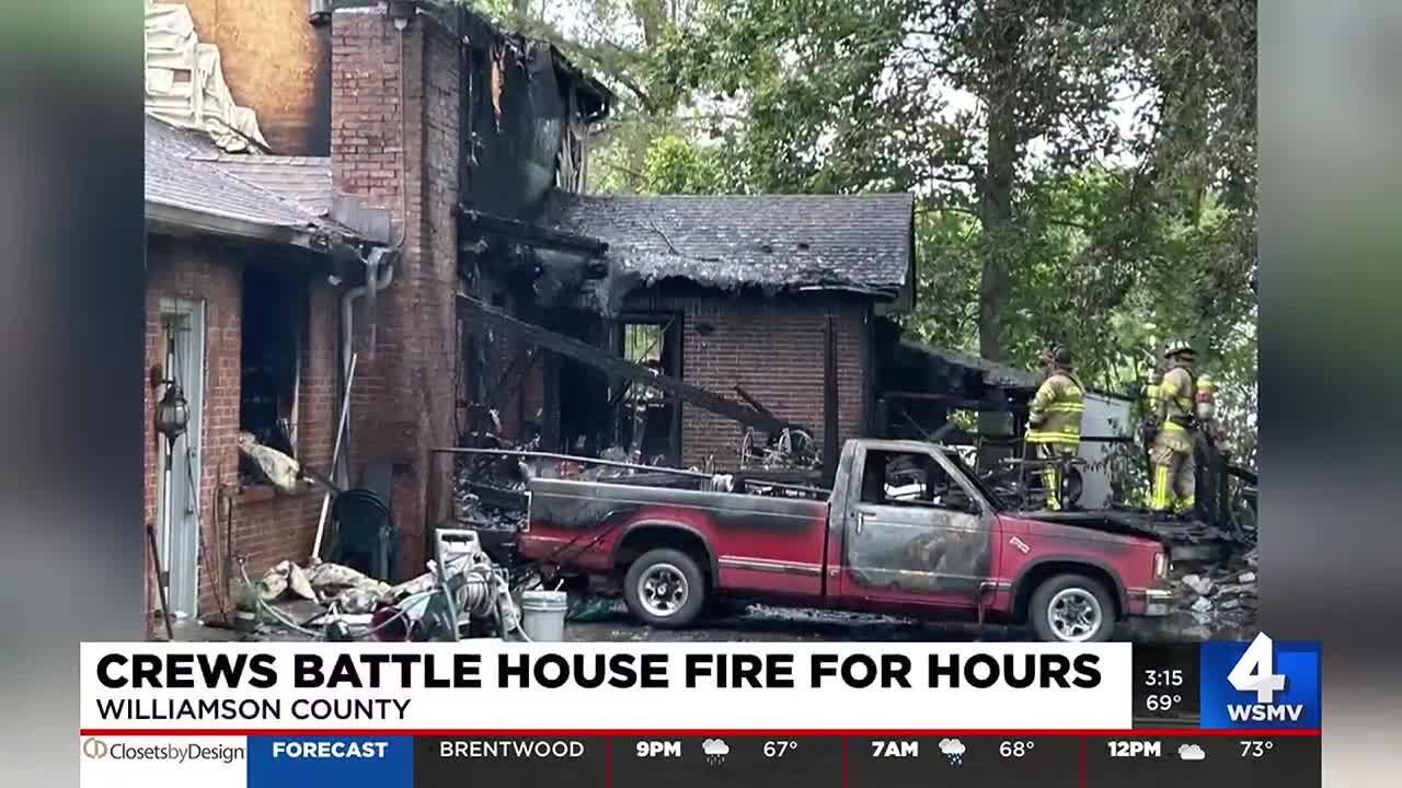 Crews battle house fire for hours - YouTube
