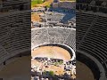 Vertical video. Balat, Turkey. Aerial close up of ancient Miletus Theatre details and seating sur...