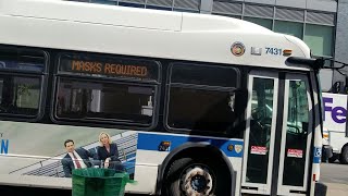 MTA: 2015 NFI XD40 #7431 on the Q13 with "Essential Workers Masks required" code