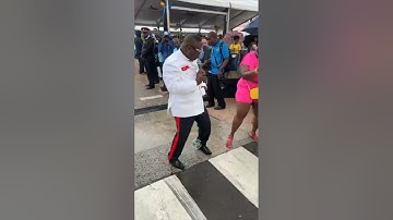 The Singing Bishop Lawrence Rolle Performs on Bay Street 2024