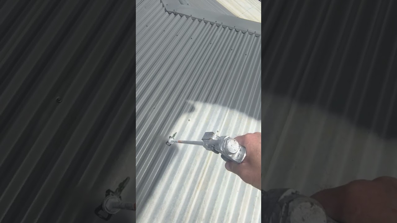 using my Bunnings ozito airless paint sprayer, roof was pressure cleaned then coated in monument.