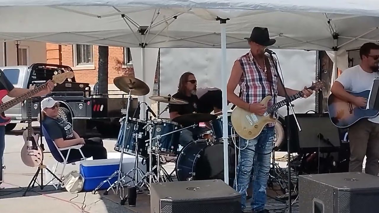 little pink houses/ Ain't that America