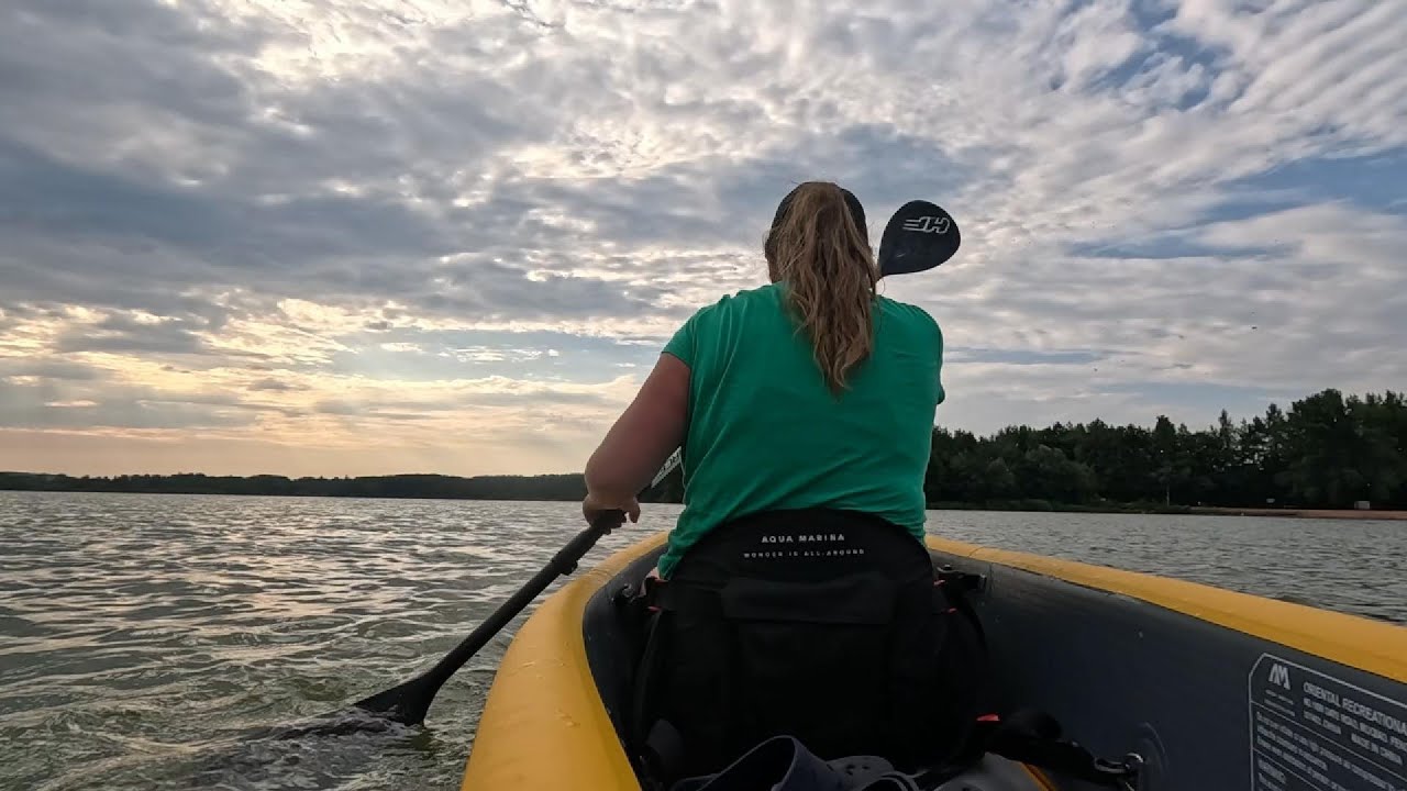 Chill, easy sunrise canoeing on a lake in Germany