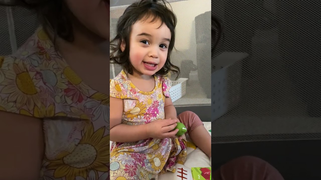 Kali’a opens her barn toy animals 