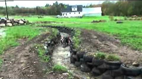 mud obstacle low crawl trench