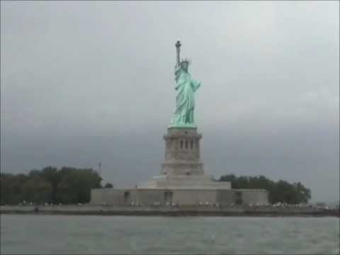 Eclipse catamaran sailing past New York.wmv