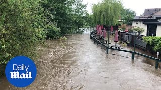 Yellow warning issued as floods submerge roads in parts of England