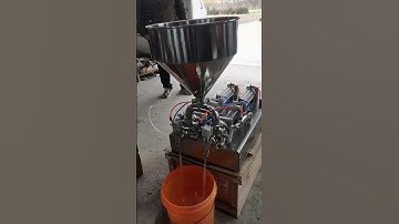 "Efficient two Nozzle Liquid Filling Machine in Action" #machine #automatic #food #pharma #filling