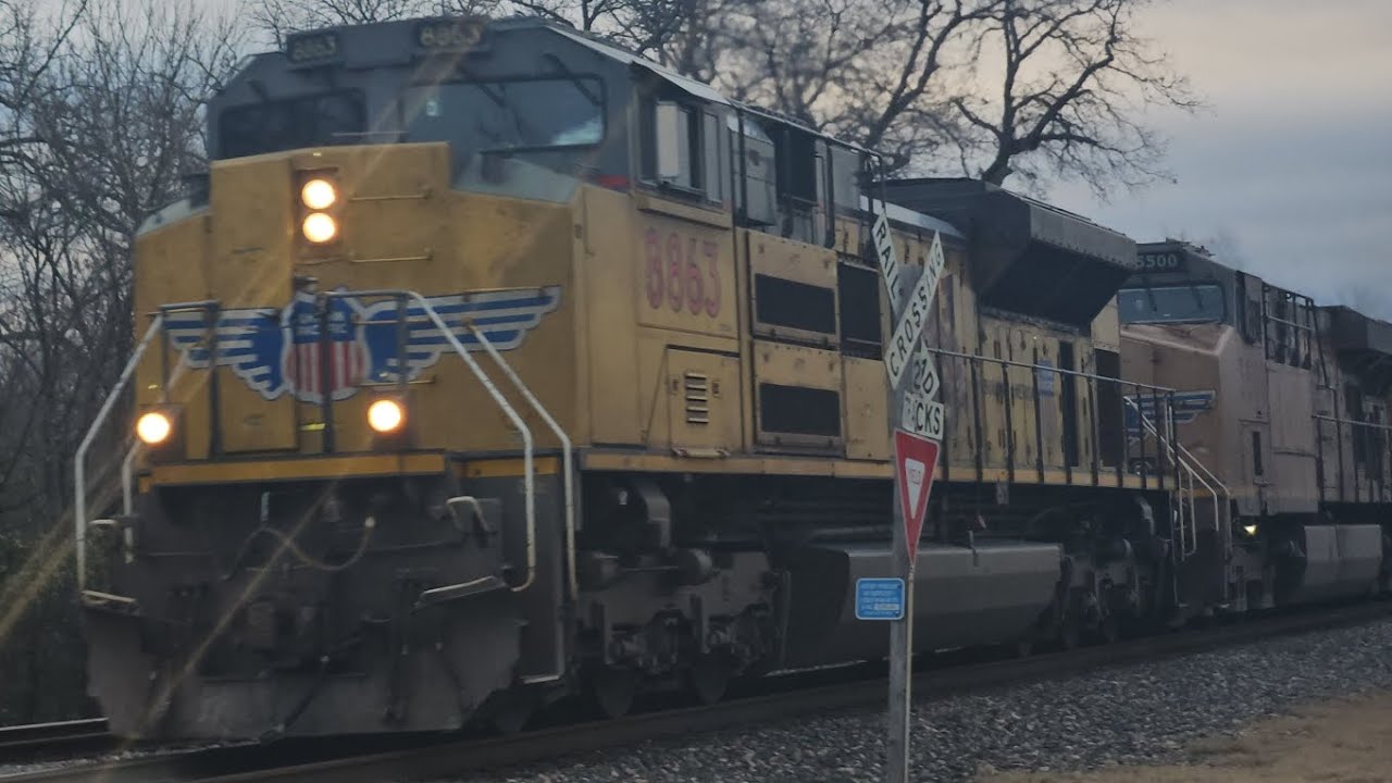 Union Pacific ZMQLA flying through Weatherford, Texas.