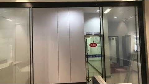 Maglev automatic sliding door system with color switchable glass. Can be open by slightly push