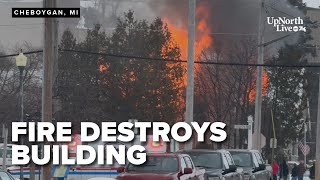 Woman charged with arson after fire destroys Cheboygan apartment building