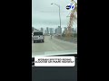 Woman rides scooter on Miami highway