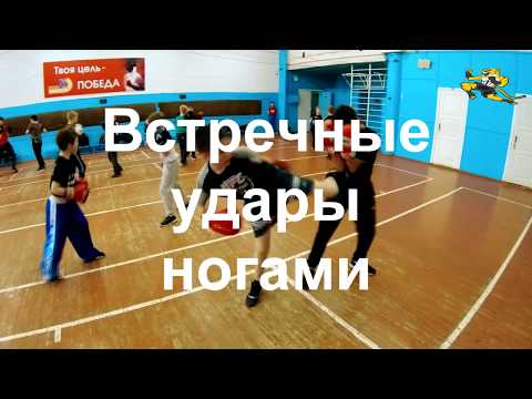 Тренировки по кикбоксингу.