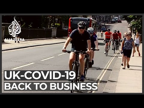 Some Britons return to work as measures ease