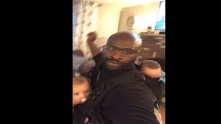 Dad Getting A Dance With His Twin Babies In A Double Carrier