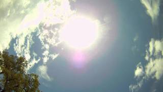 Time Lapse - Sun burning up clouds