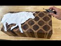 Hand carving a patterned wood block