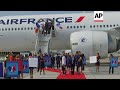 World Cup winners arrive at Charles de Gaulle airport to heroes' welcome