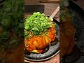 Eating Hiroshima-style Okonomiyaki in Japan