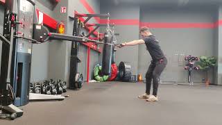 Standing cable pull with thoracic rotation